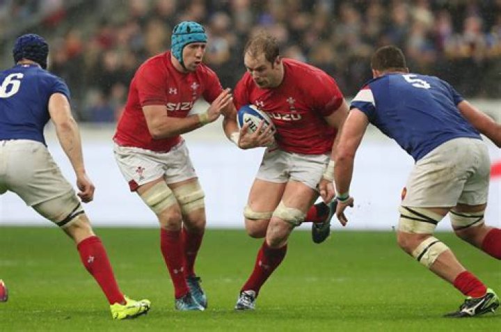 What do rugby players spray on them?